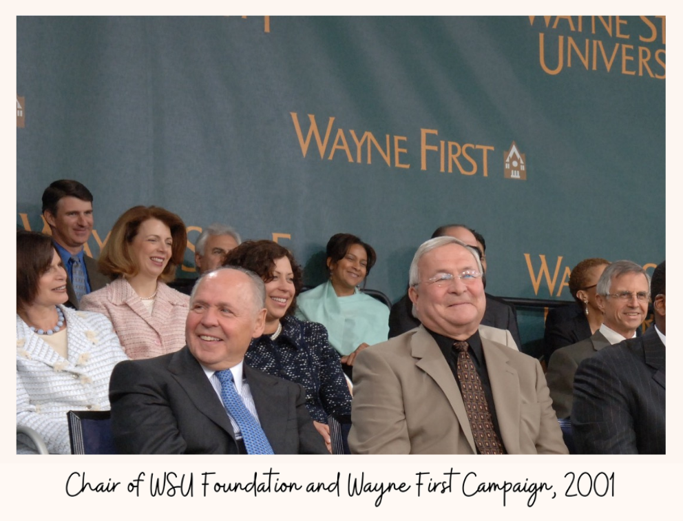Eugene Applebaum smiling and sitting down at Wayne First event