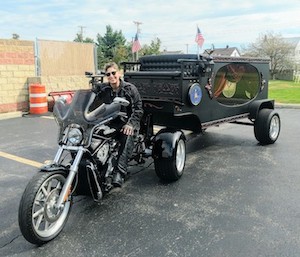 Sharon Gee-Mascarello with her Harley hearse
