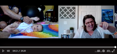 Kristina Reid conducts a video PT session with a baby.