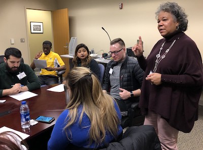 Occupational Therapy Program Director Doreen Head works with students from a range of programs on an activity during WSU Applebaum's IPE event in January 2020.
