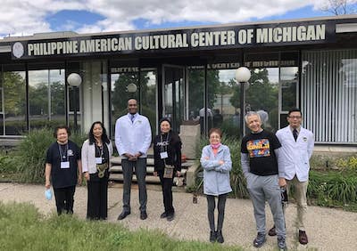 Joseph Paul Javier with Johnie Bailey and others at the Philippine American Cultural Center of Michigan