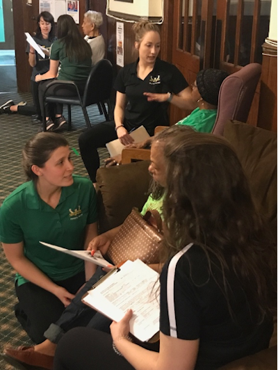 Students interview seniors during Balance and Fall Screenings at St. Patrick’s Senior Center in Detroit.