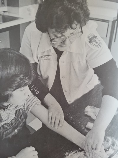 Carol Wiley working with a patient