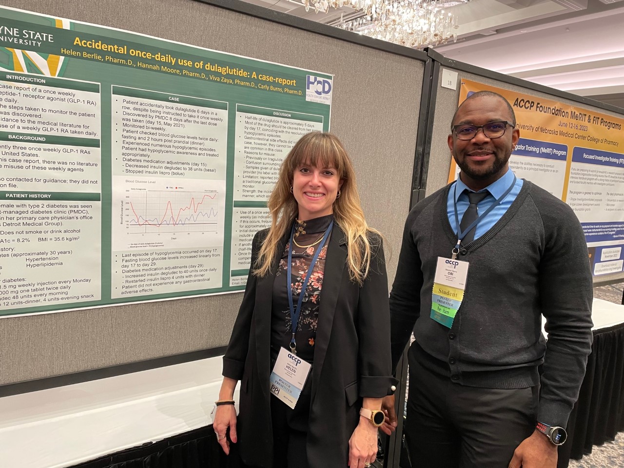 Dr. Helen Berlie and PharmD student Obioma Opara with a research poster