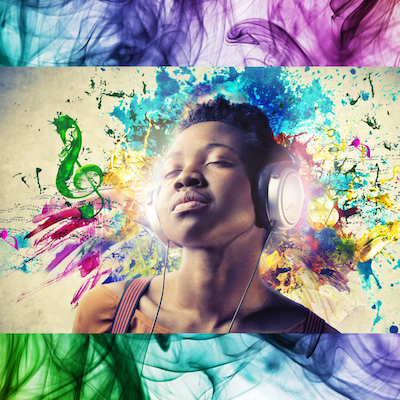 woman listening to headphones with rainbow music design