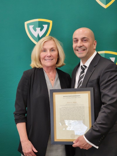 Dr. Moh H. Malek (right) with Health Care Science Chair Diane Adamo  at Wayne State’s Academic Recognition Ceremony.